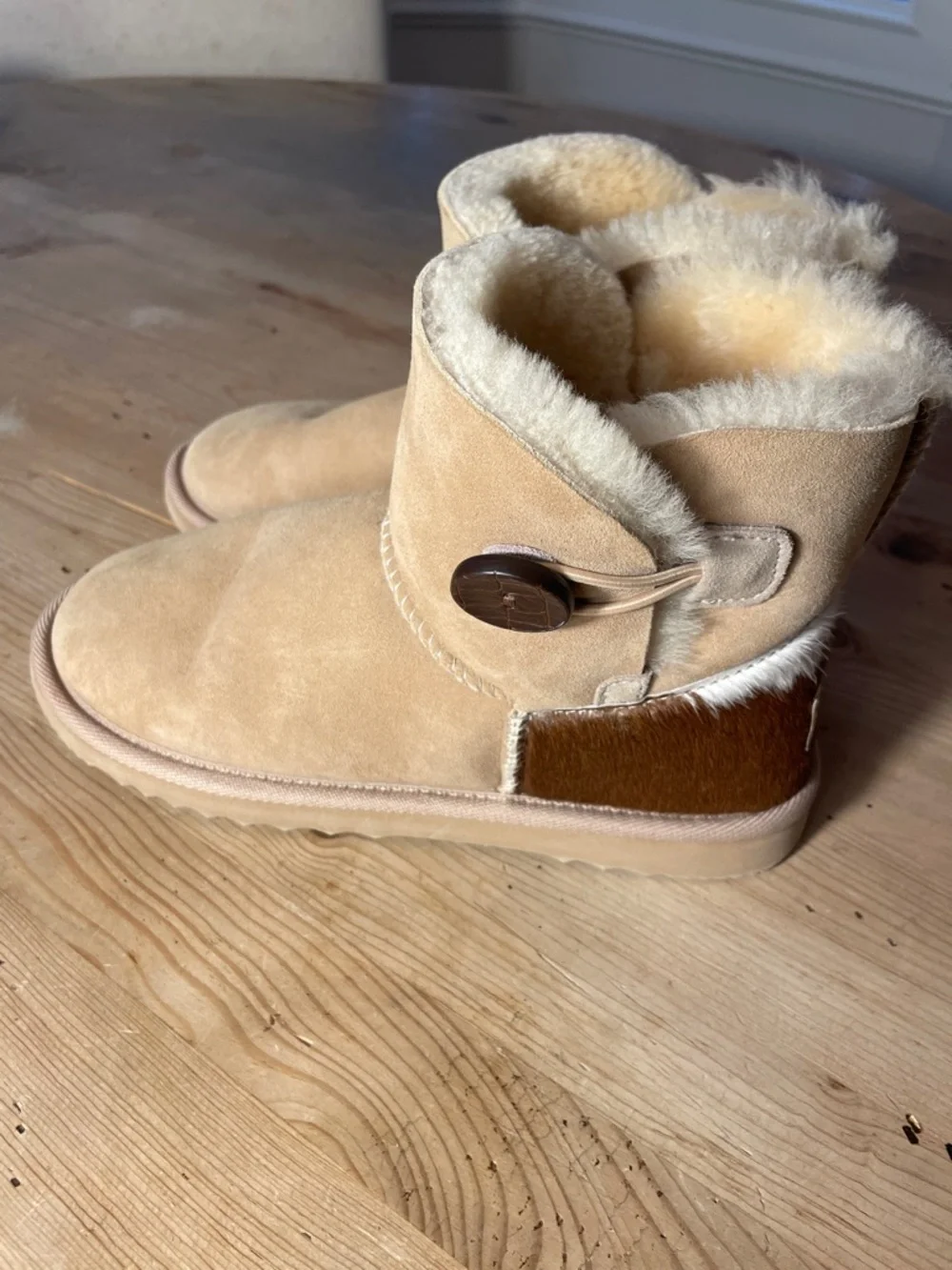UGG Rare Cowhide Calf Hair Mini Bailey Button Shearling Boots Chestnut